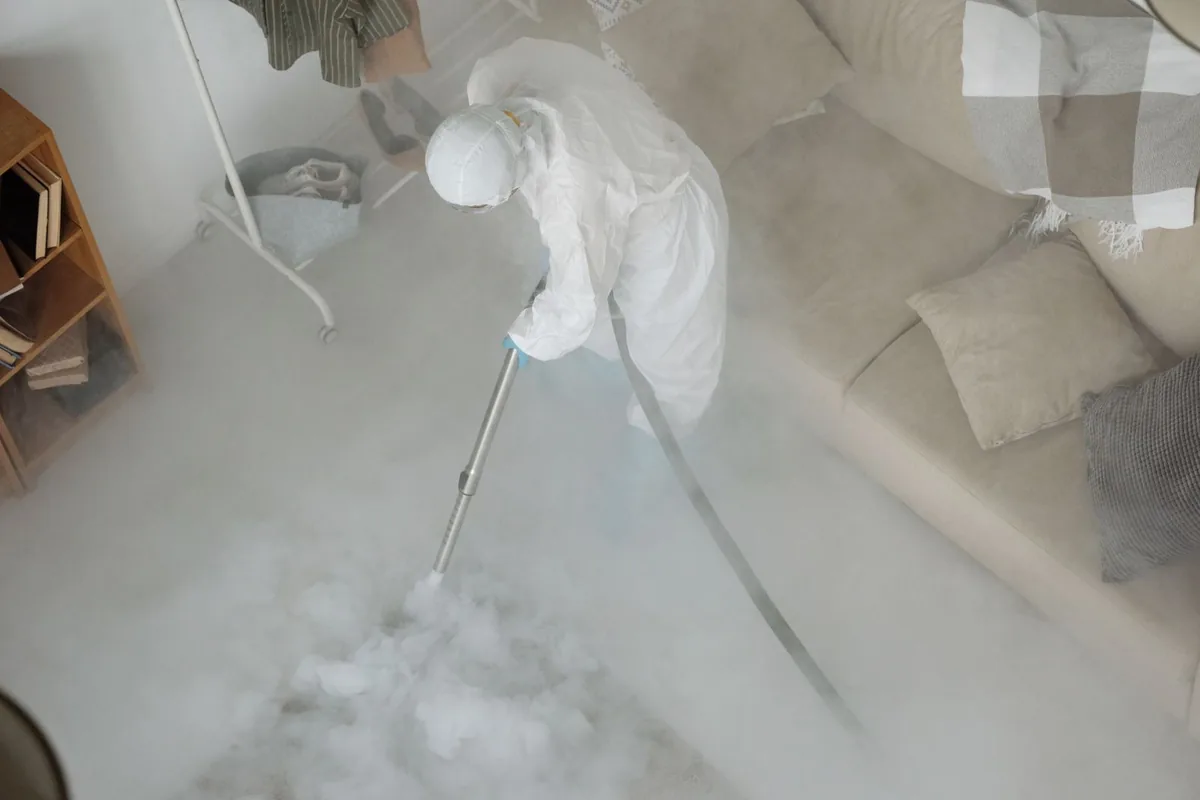 Biohazard cleanup technician in protective equipment, Umatilla, OR